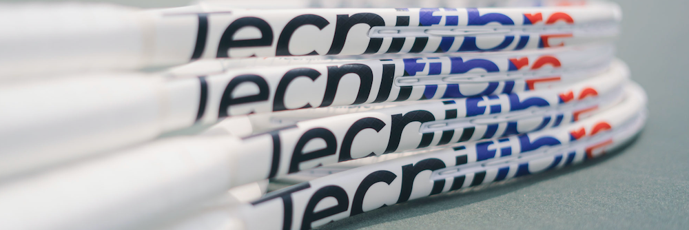 Tecnifibre T-Fight tennis rackets being displayed on a court.