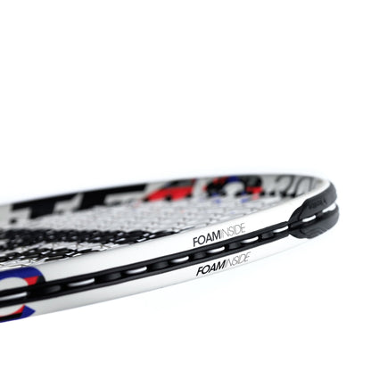 Detailed view of the Extense BG grommets of the TF40 305 tennis racket