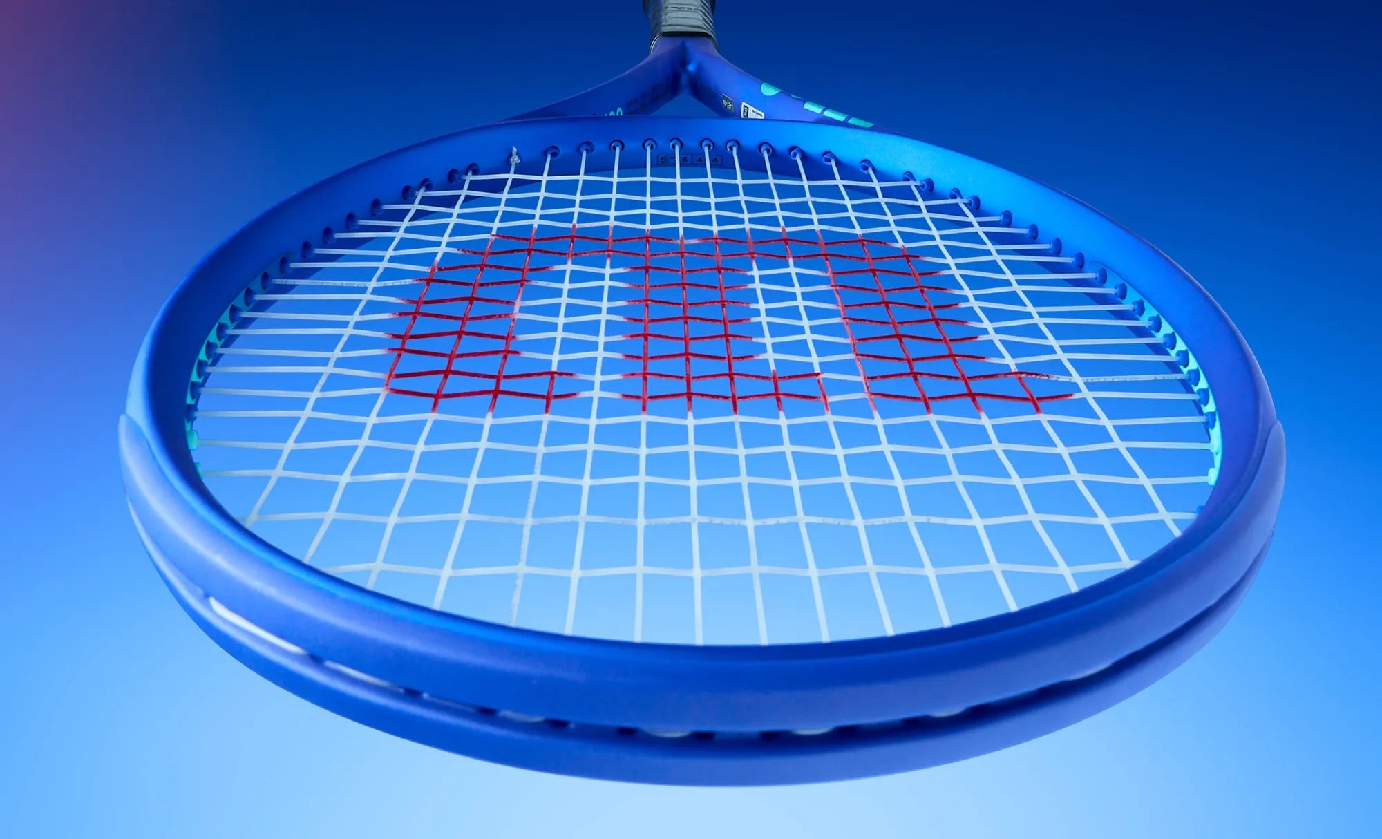 Blue tennis racket with red strings on a blue background